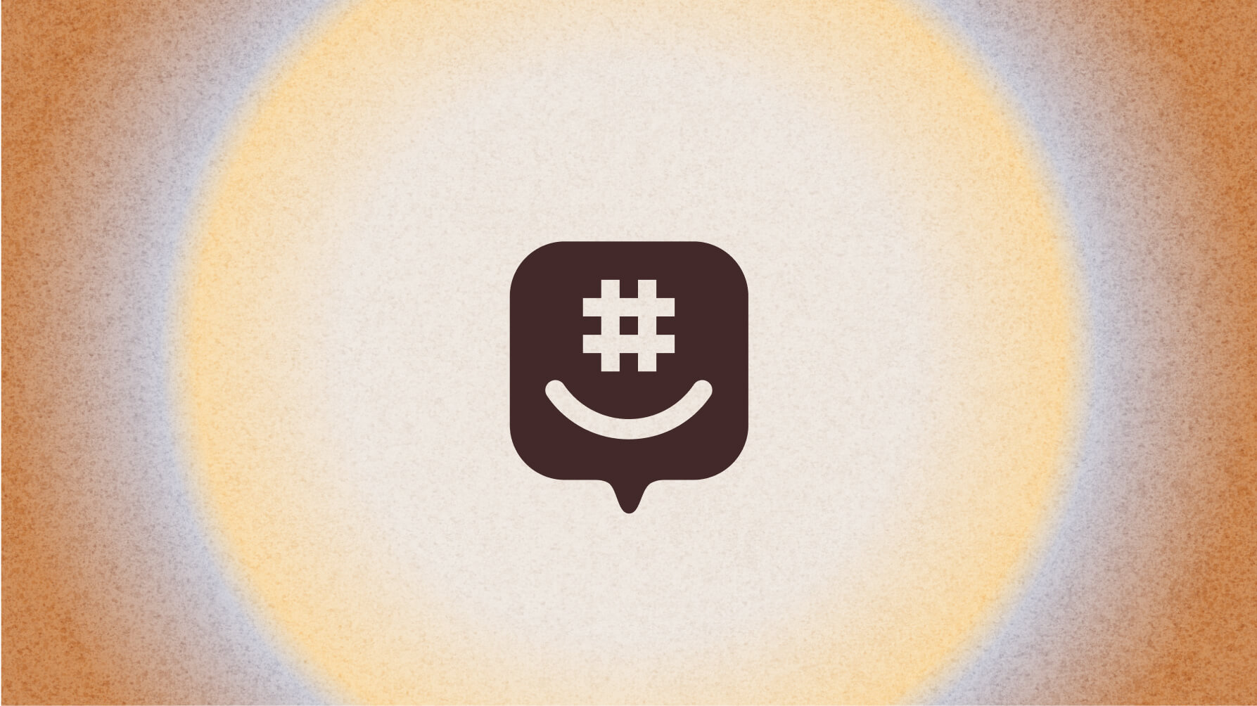 A dark chat bubble icon with a hashtag and a smile inside, centered on a textured background with a glowing white and orange gradient halo.