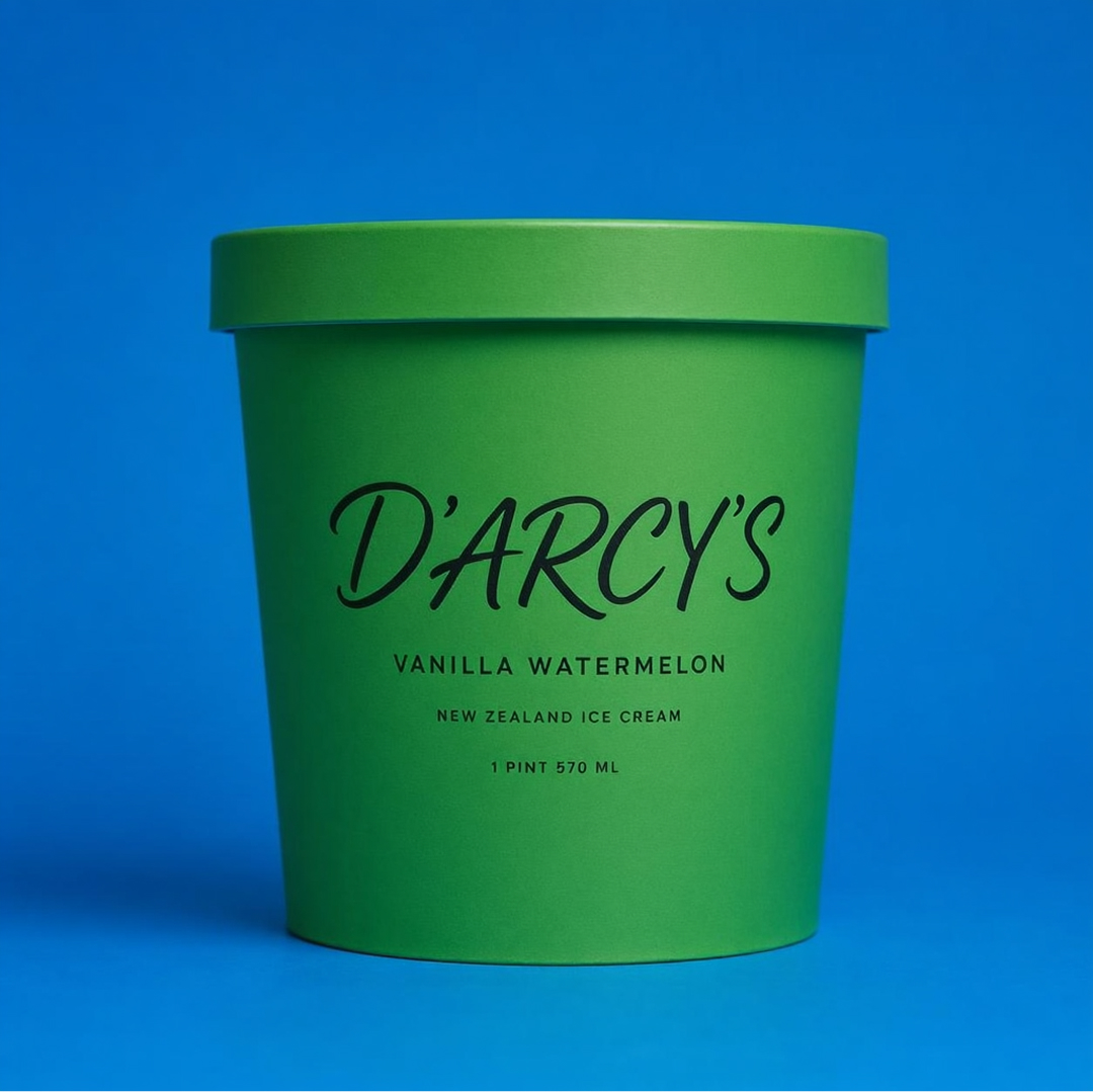 A green ice cream pint container labeled "DARCY'S Vanilla Watermelon New Zealand Ice Cream, 1 Pint 570 mL," set against a blue background.