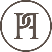 A stylized logo featuring the letters "P" and "H" intertwined, enclosed within a simple circular border, all in brown on a light background.