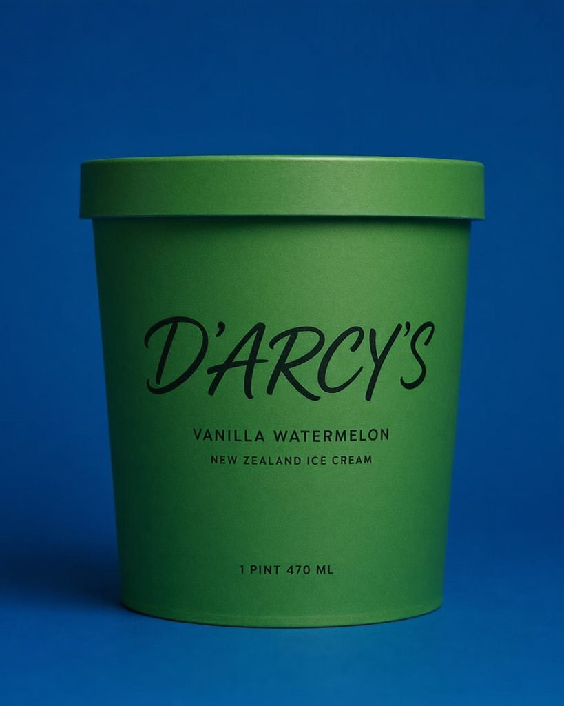 A green ice cream container labeled "D'ARCY'S Vanilla Watermelon New Zealand Ice Cream, 1 Pint 470 mL," set against a solid blue background.